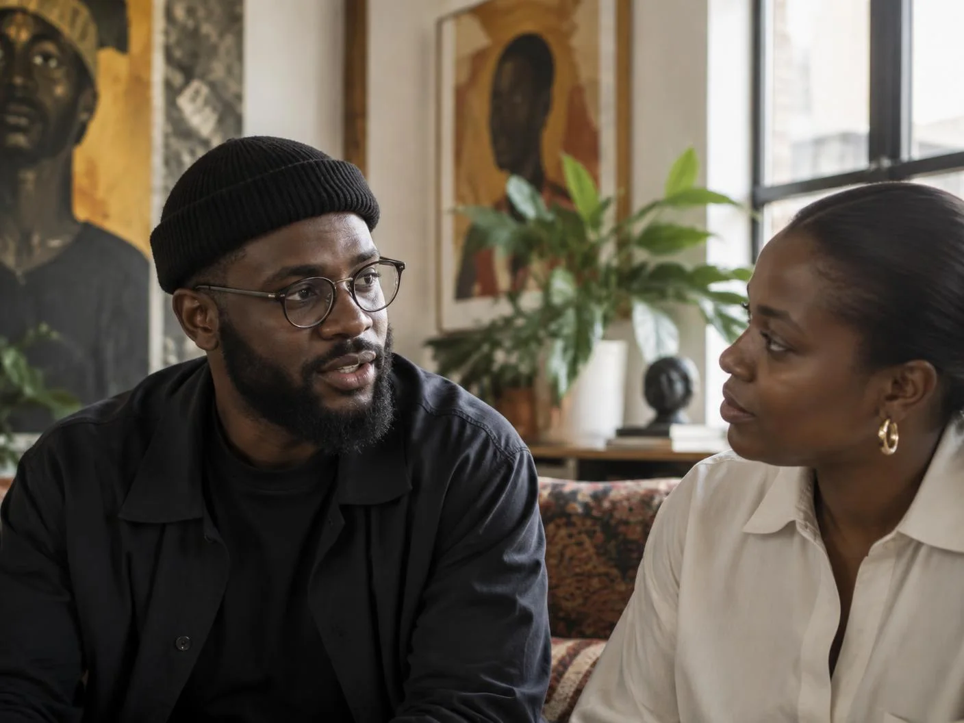 Creative director in conversation with a client in a studio lounge
